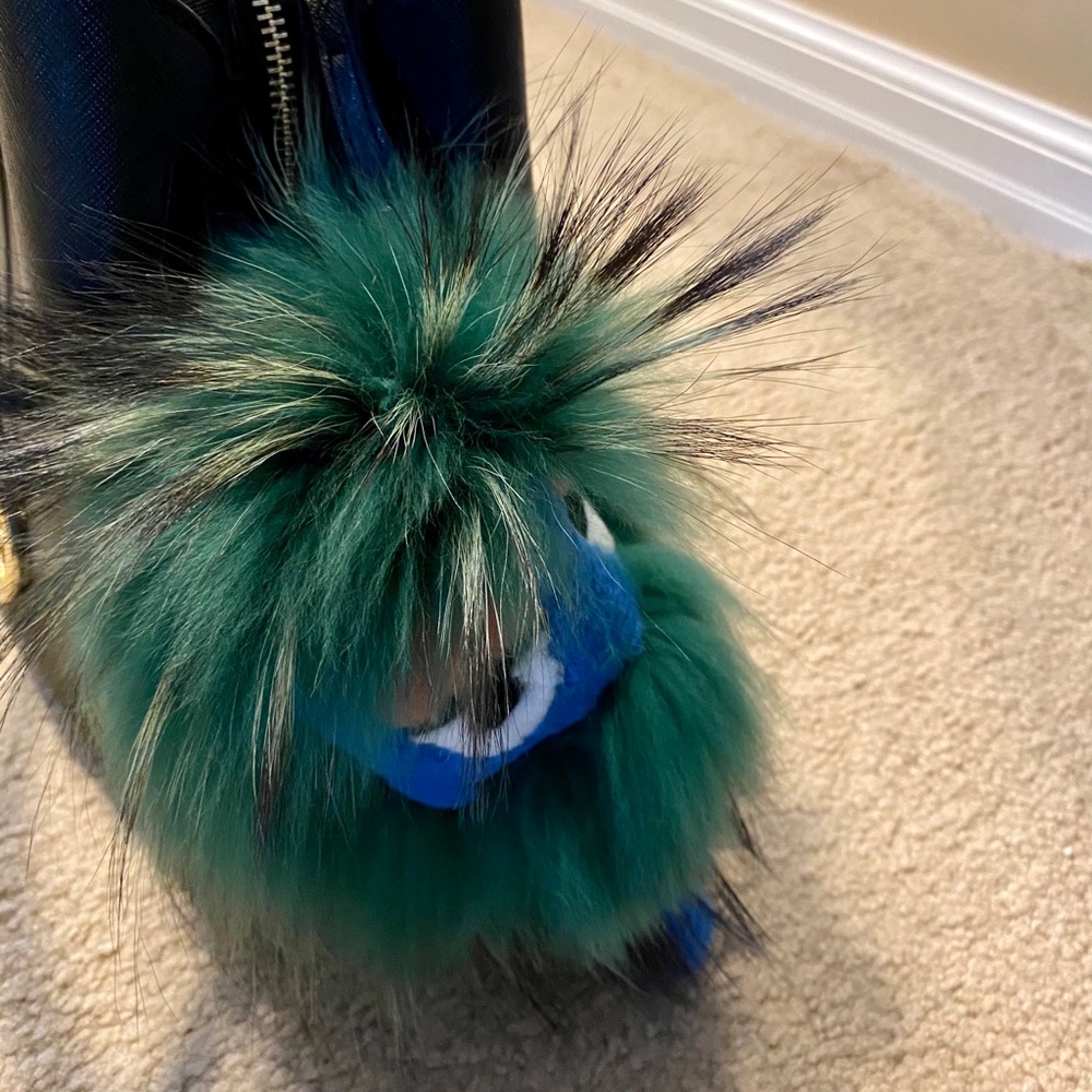 Monster real fur purse pom pom.